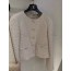 beige tweed jacket