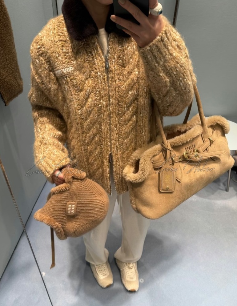 Twisted knitwear zip-up